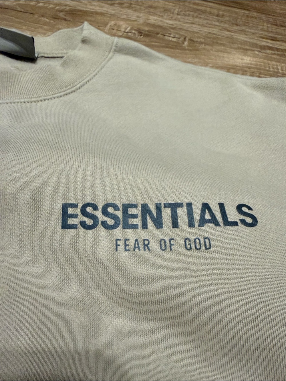 Fear of God ESSENTIALS Crewneck Sweatshirt in Light Beige with Navy Logo kids